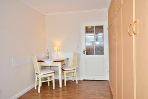 1-Zimmer-Appartement mit Schrankbetten und Essplatz