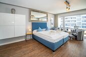 1-Zimmer-Appartement mit feststehendem Doppelbett