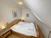 Schlafzimmer mit Doppelbett