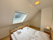 Schlafzimmer mit Doppelbett
