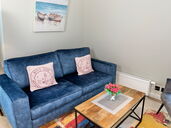 Wohnzimmer - Sitzbereich mit Sofa