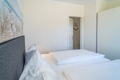 Schlafzimmer mit Doppelbett